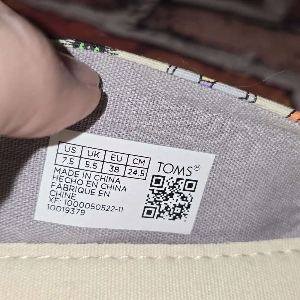 Toms Cream Halloween Slip-Ons
